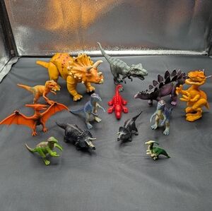 Lot Of 13 Dinosaur Figures.  Various Sizes.  All Are In Great Condition.